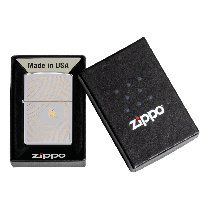 srebrna zapalniczka Zippo ze złotymi okrągami w czarnym pudełeczku srebrna zapalniczka Zippo ze złotymi okrągami w czarnym pudełeczku