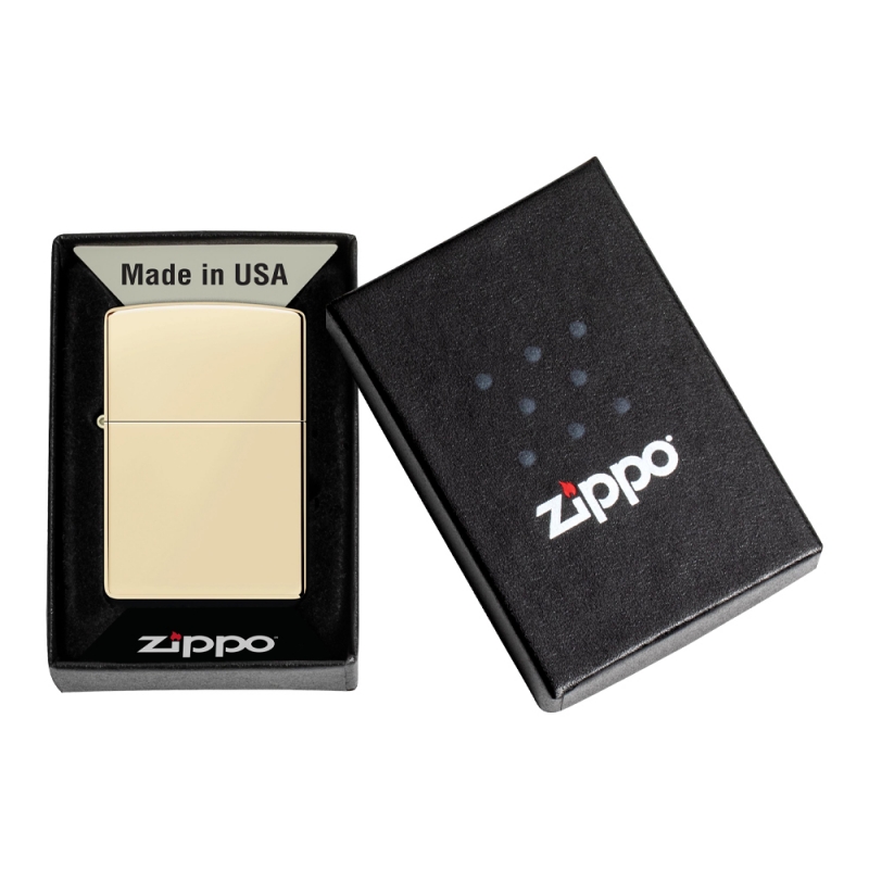 oryginalne pudełko z logo Zippo ze złotą zapalniczką w środku