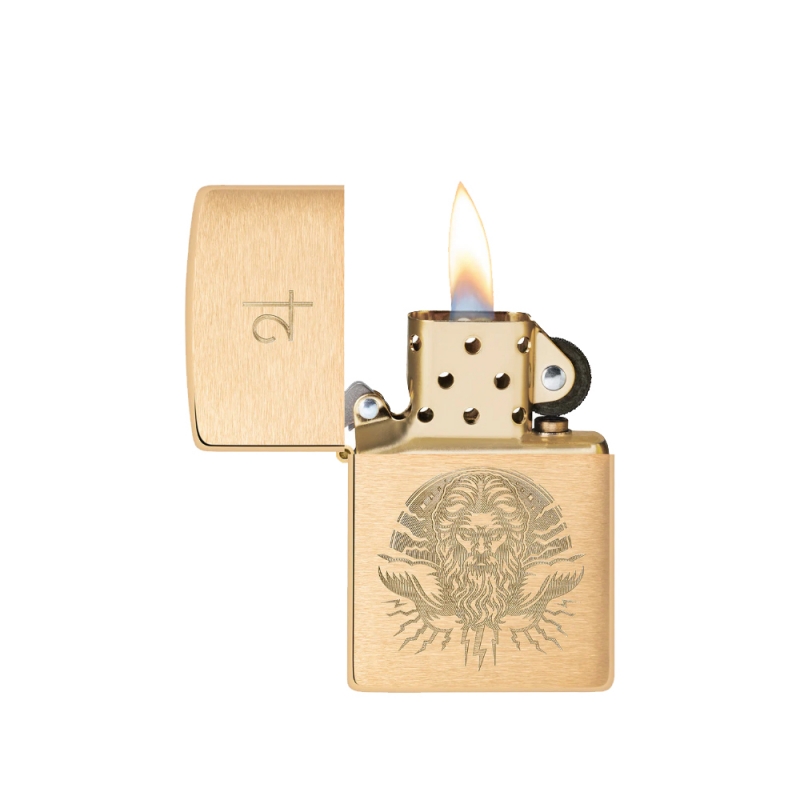 odpalona zapalniczka Zippo z systemem windproof w kolorze złota