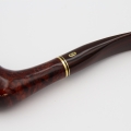 drewniana lakierowana fajka ze złotą linią na łączeniu