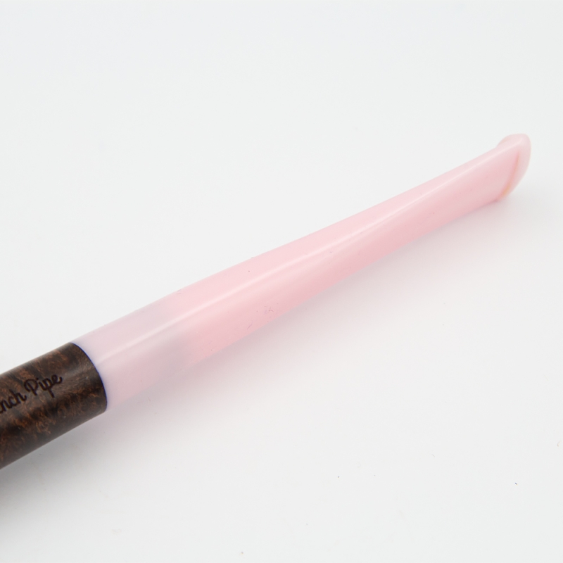 różowy plastikowe ustnik od małej fajki
