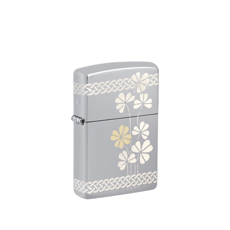 obudowa zapalniczki z klasycznym metalowym wykończeniem ozdobiona wzorem koniczyny na całej powierzchni