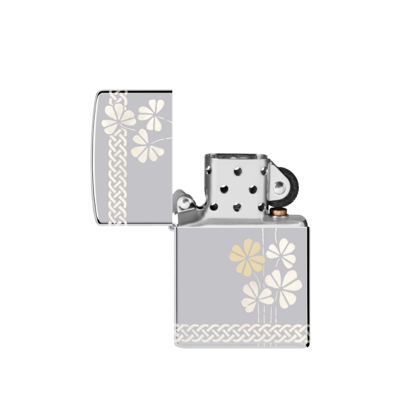 otwarta zapalniczka z widocznym srebrzystym kominkiem kontrastującym z motywem koniczyny na obudowie