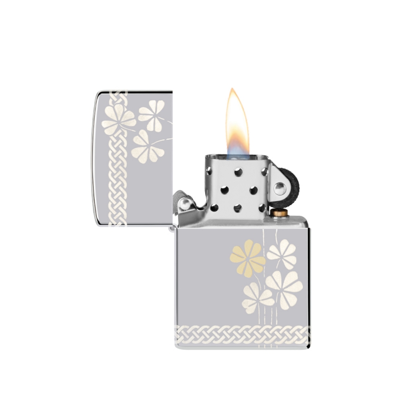 elegancka kobieca zapalniczka Zippo w srebrnym kolorze z finezyjnym zdobieniem w postaci koniczynek