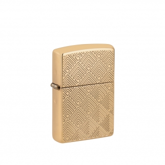 obudowa zapalniczki Zippo w połyskującym złotym odcieniu z misternym geometrycznym wzorem który biegnie przez całą powierzchnię