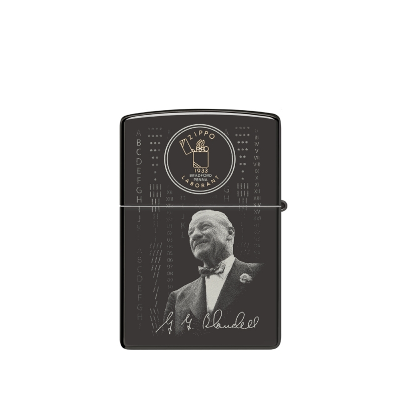 obudowa zapalniczki z tylnią częścią ukazującą starszą wersję twórcy i jego podpisem pod postacią