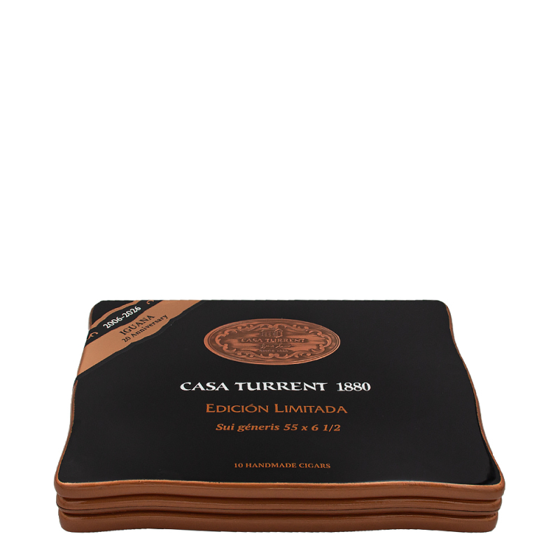 zamknięte pudełko w czarno złotym kolorze i naklejką 25th. Anniversary Iguana