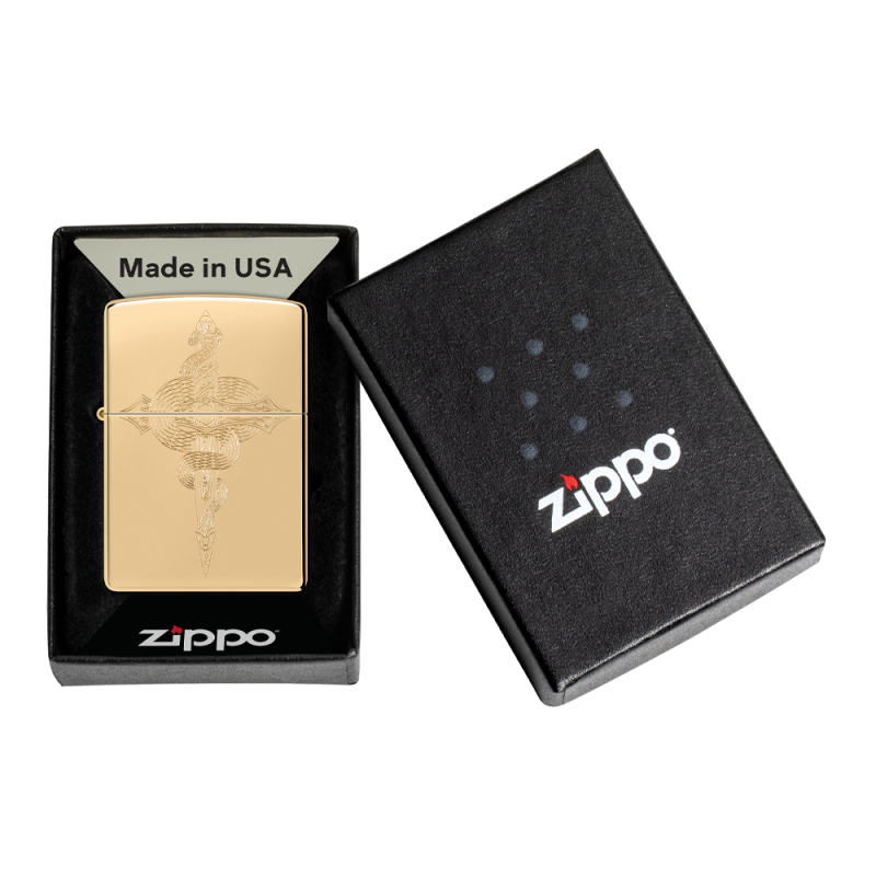 Złota zapalniczka Zippo Serpent Design umieszczona w pudełku z wyciętym motywem węża na obudowie